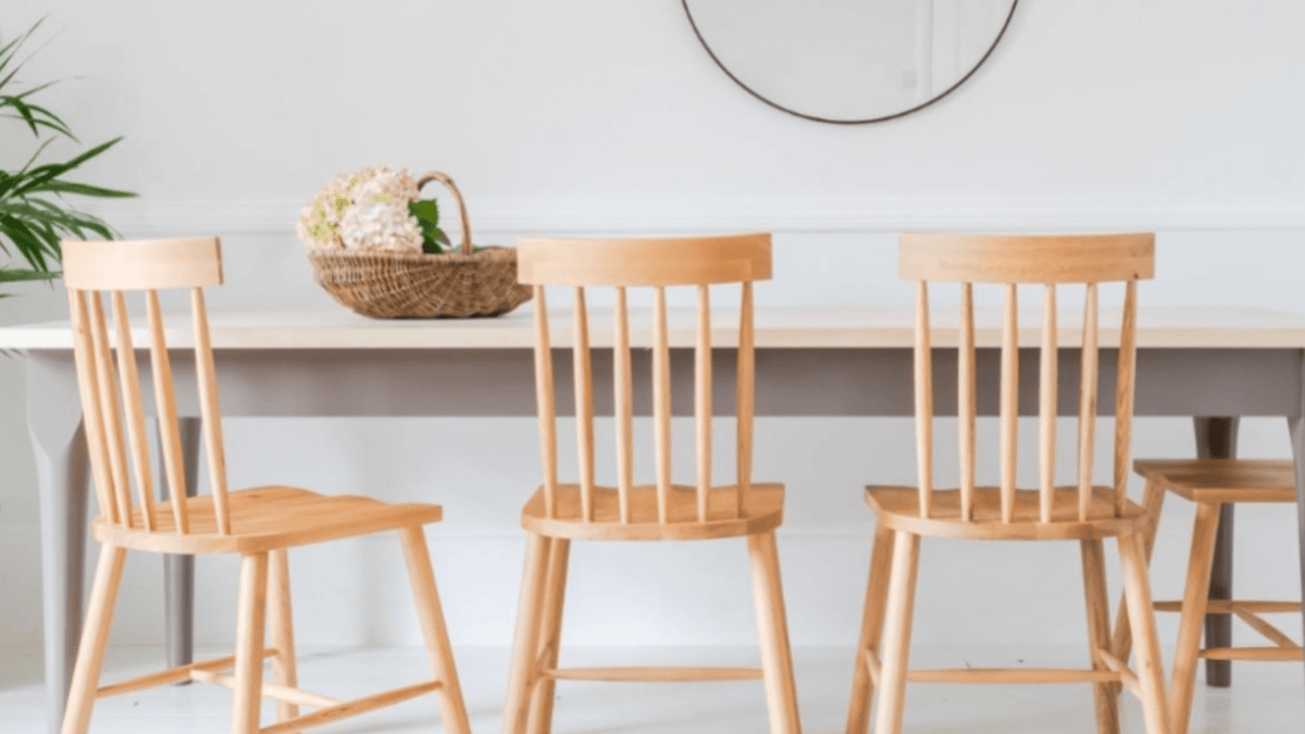 Scandi dining table with grey finish and wooden chairs